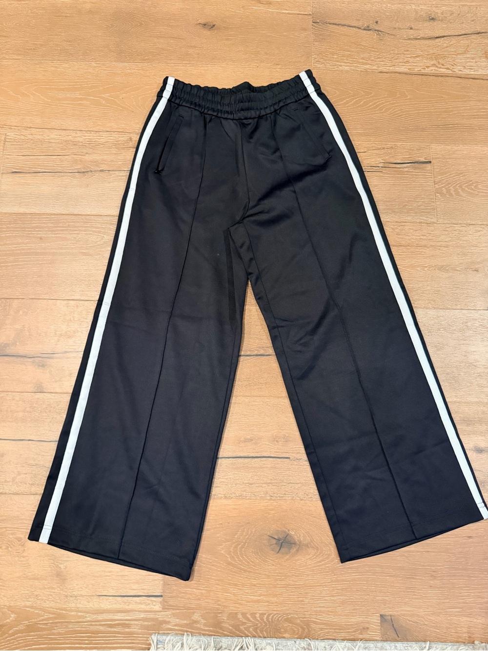 Athleta Black Wide-Leg Track Pants with White Side Stripes